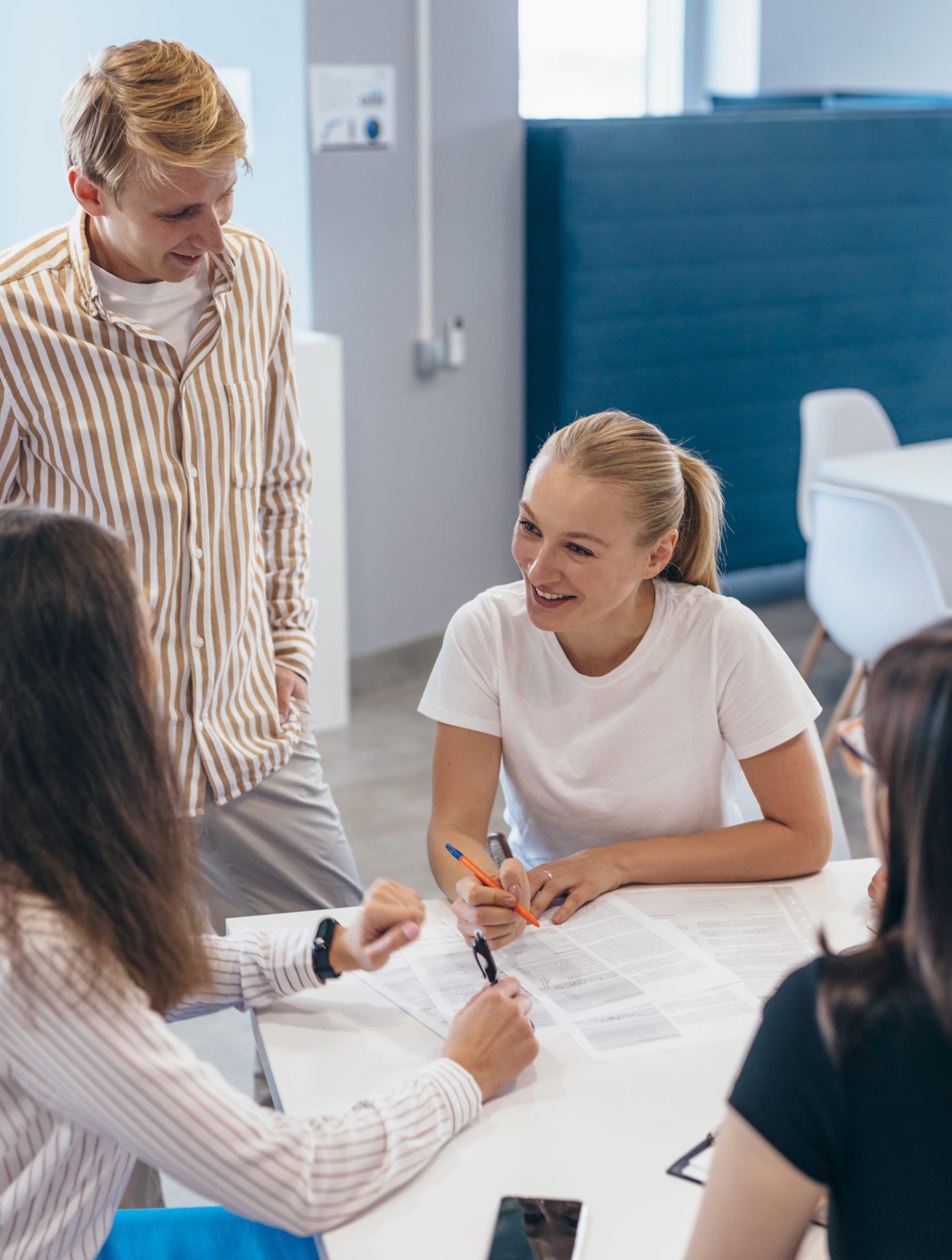 People Having Meeting Around Table In Office. People Having Meeting Around Table In Office